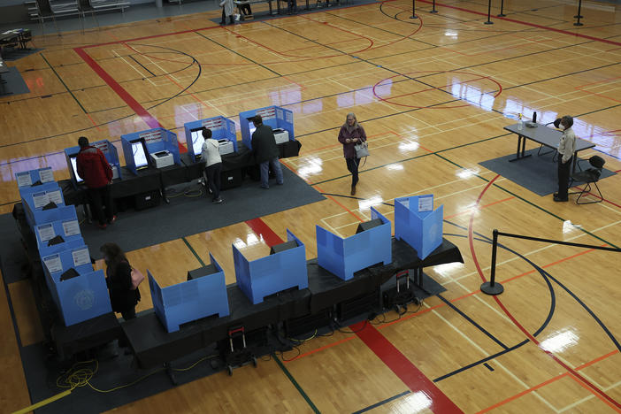 Georgia voters cast their ballots in a U.S. Senate runoff election on Dec. 6, 2022, in Norcross, Ga.