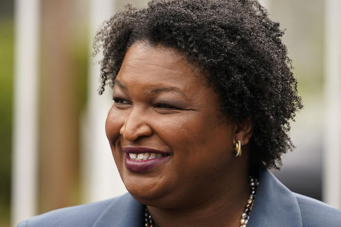 Then-Georgia Democratic gubernatorial candidate Stacey Abrams talks to the media on May 24, 2022, in Atlanta. Abrams was appointed Wednesday as Howard University's first chair for race and Black politics.