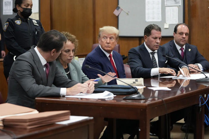 Former President Donald Trump in court for his arraignment in New York Tuesday. The judge overseeing the case did not issue a gag order. Instead he warned against saying or doing anything that could incite violence, create civil unrest or jeopardize the safety or well-being of any individuals.