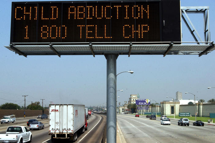 A freeway sign over Interstate 5 in Los Angeles flashes a message about a child abduction as part of the statewide Amber Alert program in August 2002. California state Sen. Steven Bradford has proposed a bill to create a special "Ebony Alert" system for missing Black women, girls and youth in the state.