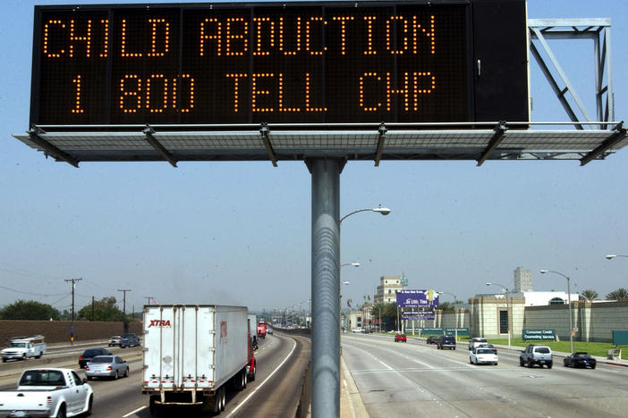 A freeway sign over Interstate 5 in Los Angeles flashes a message about a child abduction as part of the statewide Amber Alert program in August 2002. California state Sen. Steven Bradford has proposed a bill to create a special "Ebony Alert" system for missing Black women, girls and youth in the state.