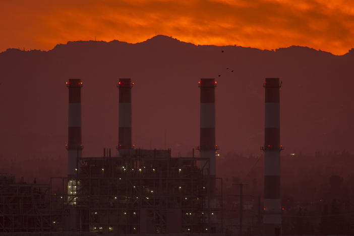 To avoid some of the worst impacts of climate change, greenhouse gas emissions need to be eliminated or offset by midcentury, according to the United Nations. To get there, activist investors say banks and insurance companies need to account for the emissions they contribute to by underwriting and investing in fossil fuel infrastructure like this natural gas plant in California.