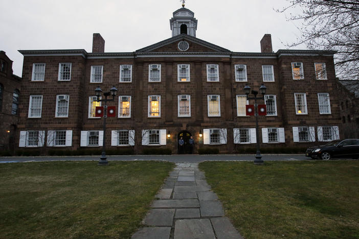 At dusk, lights remain on at Rutgers University's Old Queens building in 2013 in New Brunswick, N.J.