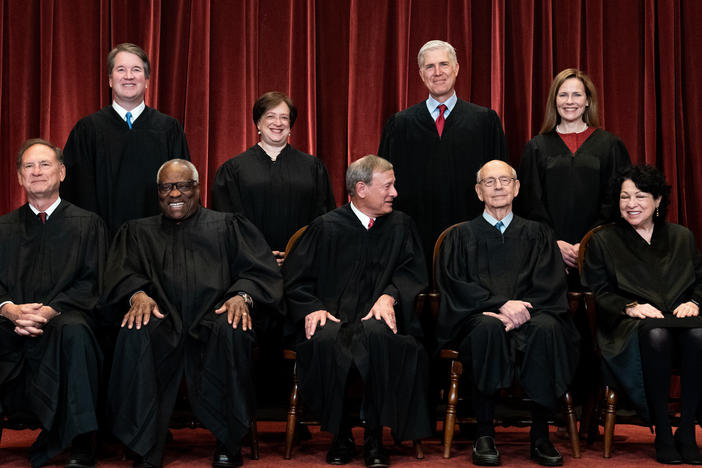 Supreme Court justices pose for a group photo in April 2021.