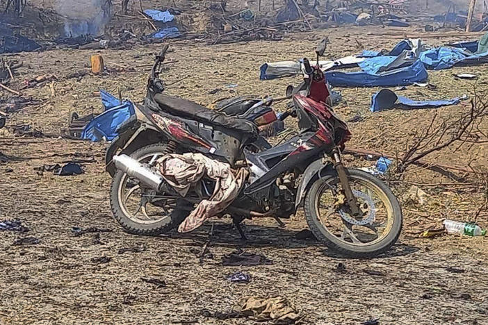 This photo provided by the Kyunhla Activists Group shows aftermath of an airstrike in Pazigyi village in Sagaing Region's Kanbalu Township, Myanmar, on Tuesday.