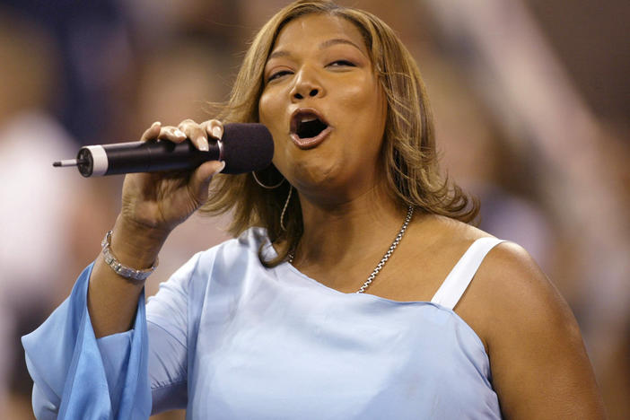 Queen Latifah sings the National Anthem at the opening ceremony of the 2002 US Open at the USTA National Tennis Center in Flushing Meadows Corona Park in Flushing, New York.