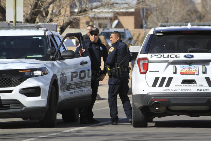 Police work outside of a home in Albuquerque, N.M., on Feb. 23. Critics say problems with training are attributed to higher levels of police killings in New Mexico.