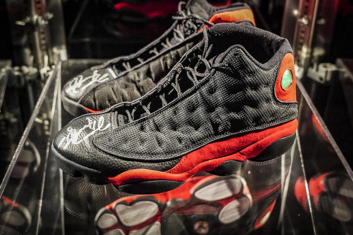 Michael Jordan's game-worn sneakers from the 1998 NBA finals are displayed at Sotheby's on April 5 in New York. On Tuesday, they sold for a record $2.2 million.