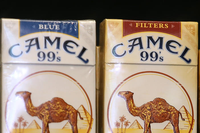 Camel cigarettes, manufactured by Reynolds American, are displayed at a tobacco shop in San Francisco in July 2014. Reynolds was one of the tobacco companies to voluntarily adopt child labor policies that exceed the requirements of U.S. law.