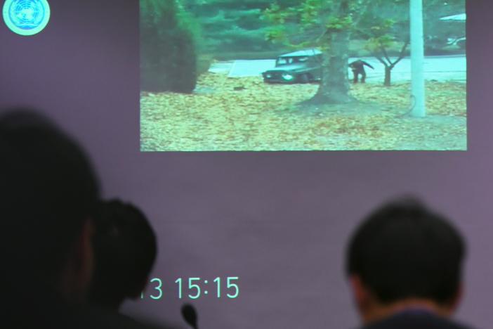 Surveillance footage of the moment a North Korean soldier defects, shown at a press briefing by the United Nations Command at the Defense Ministry in Seoul on Nov. 22, 2017. A North Korean soldier crossed the border into the South in breach of a 1953 armistice agreement, as he pursued a defector who was shot last week, the United Nations Command said.