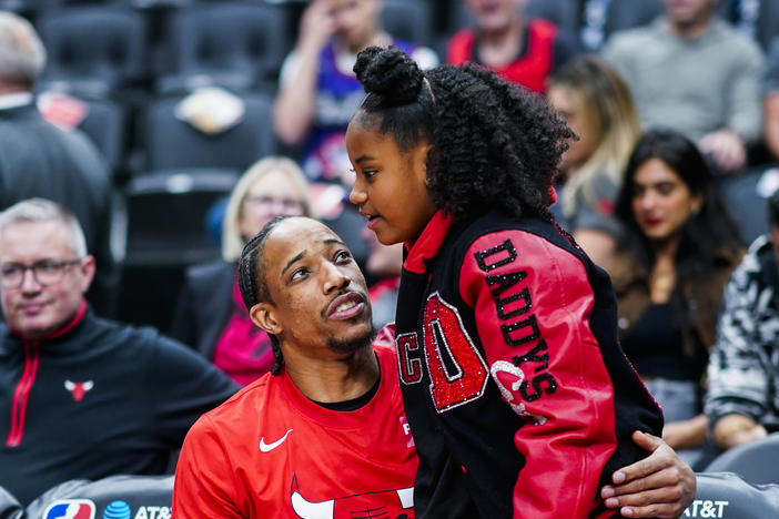 DeMar DeRozan embraces his daughter Diar before the game against the Toronto Raptors at the Scotiabank Arena in Toronto, Ontario, Canada.