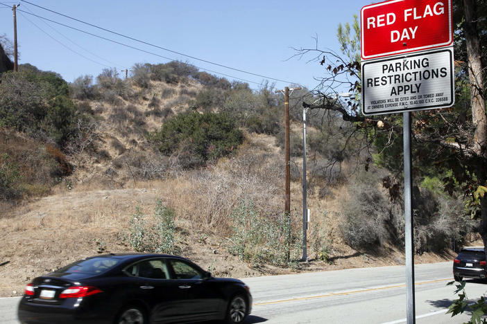 A red flag fire warning sign as seen in October 2013 in Pasadena, Calif.