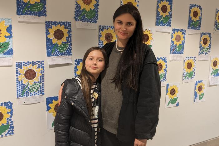 Tetiana Lytvynenko and her 9-year-old daughter Darina, seen at the Ukrainian Museum in New York City, are living rent-free with a family in Brooklyn, where they cook borsht and crepes for their hosts.