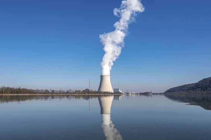 Water vapor rises from the nuclear power plant Isar II in Essenbach, Germany, on March 3, 2022.
