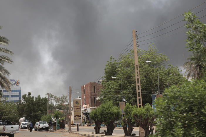 Smoke is seen rising from a neighborhood in Khartoum, Sudan, on Saturday. Fierce clashes between Sudan's military and the country's powerful paramilitary erupted in the capital and elsewhere in the African nation after weeks of escalating tensions between the two forces.