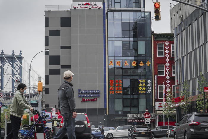 A six story glass facade building, center, is believed to be the site of a foreign police outpost for China in New York's Chinatown, Monday, April 17, 2023.