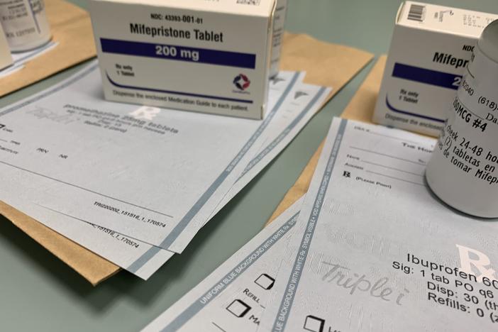 Boxes containing doses of the abortion pill mifepristone are laid out at the Hope Clinic in Illinois. The Comstock Act of 1873, which outlawed the distribution of "obscene" materials such as contraception, is being cited as a basis for blocking the mailing of mifepristone.