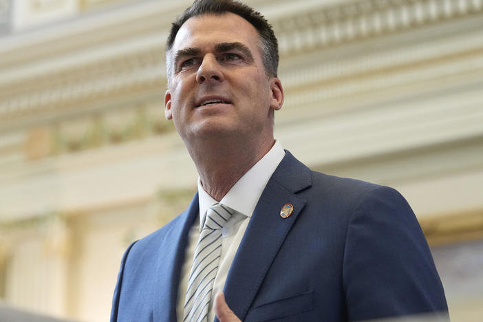 Oklahoma Gov. Kevin Stitt delivers his State of the State address on Feb. 6 in Oklahoma City. He has called on county officials heard making racist remarks to resign.