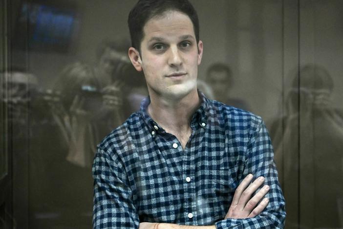 U.S. journalist Evan Gershkovich, arrested on espionage charges, stands inside a defendants' cage before a hearing to consider an appeal on his arrest at the Moscow City Court on Tuesday.