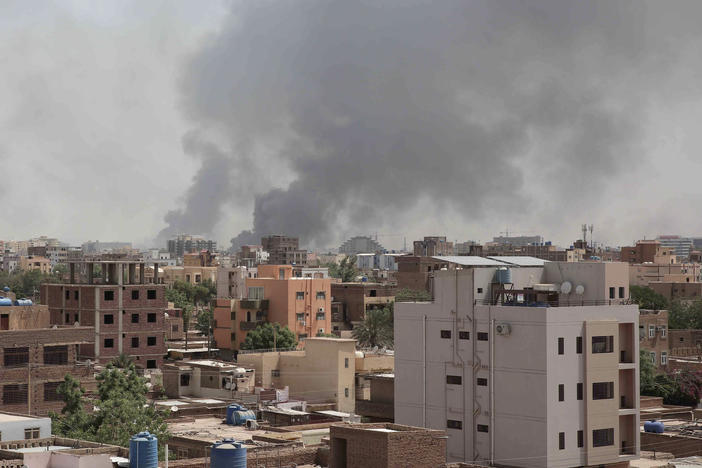 Smoke is seen rising from Khartoum's skyline on Sunday. The Sudanese military and a powerful paramilitary group battled for control of the chaos-stricken nation, signaling they were unwilling to end hostilities despite mounting diplomatic pressure to cease fire.