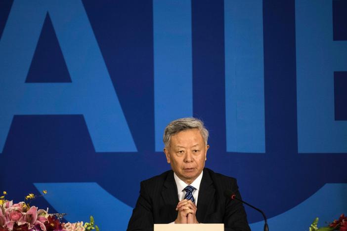 Jin Liqun, AIIB's president, addresses journalists at a Beijing press conference in 2016.