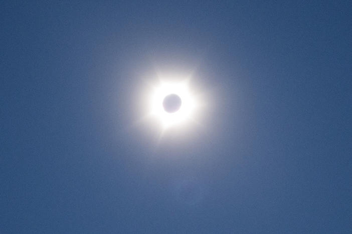 The sun and moon are photographed near Exmouth, Australia, during a solar eclipse on Thursday, April 20, 2023. The lucky few in the path of the hybrid solar eclipse will either get plunged into the darkness of a total eclipse or they'll see a "ring of fire" as the sun peeks out from behind the moon.