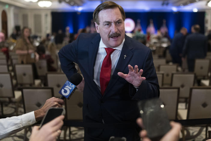 MyPillow chief executive Mike Lindell talks to reporters at the Republican National Committee winter meeting in Dana Point, Calif., on Jan. 27.