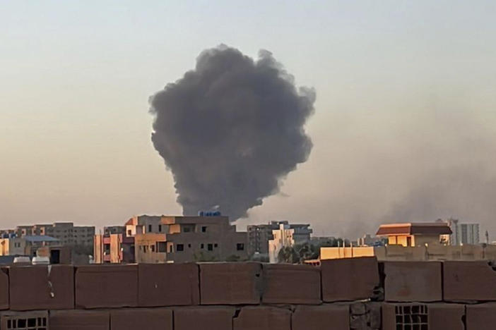 In this photo provided by Maheen S, smoke fills the sky in Khartoum, Sudan, near Doha International Hospital on Friday, April 21, 2023.
