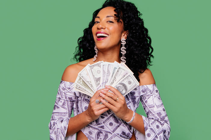 Berna Anat, author, podcaster, and financial hype woman.