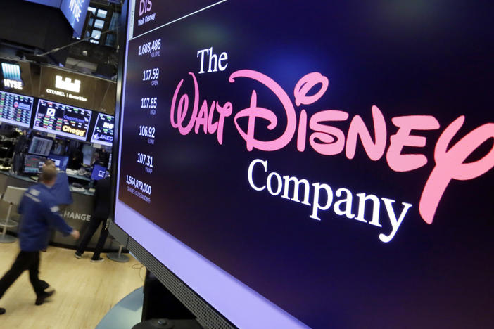 The Walt Disney Co. logo appears on a screen above the floor of the New York Stock Exchange on Aug. 8, 2017, in New York.