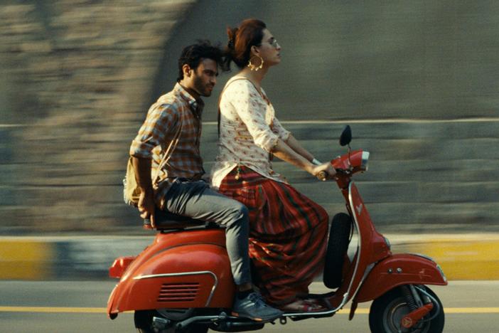 Ali Junejo (left) and Alina Khan portray a married man and a transgender woman who kindle a romance in Pakistani director Saim Sadiq's award-winning film <em>Joyland. </em>