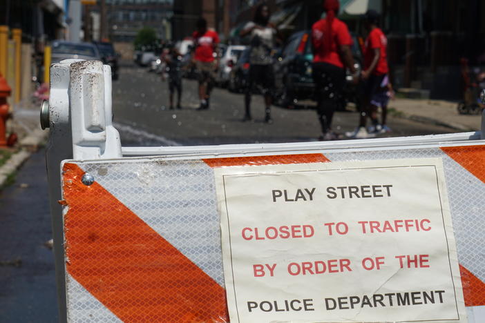Children play outside in Kensington, a neighborhood in Philadelphia known for open-air drug markets and gun violence. Last year, due to safety concerns, the Philadelphia Police Department downsized its outdoor summer play program.