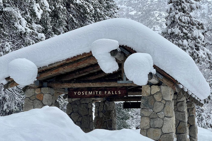 In this photo provided by the National Park Service, a structure at Yosemite Falls in Yosemite National Park, Calif., is covered in snow on Feb. 28.