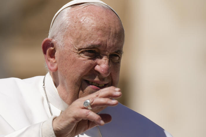 Pope Francis leaves at the end of his weekly general audience in St. Peter's Square, at the Vatican, on Wednesday.