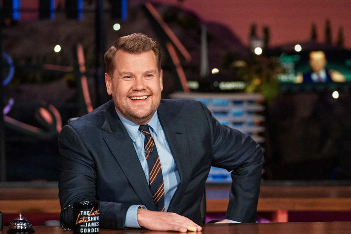 James Corden behind the desk at <em>The Late Late Show.</em>