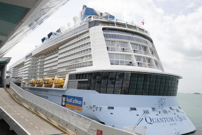 The Quantum of the Seas cruise ship is docked at the Marina Bay Cruise Center Wednesday, Dec. 9, 2020 in Singapore.