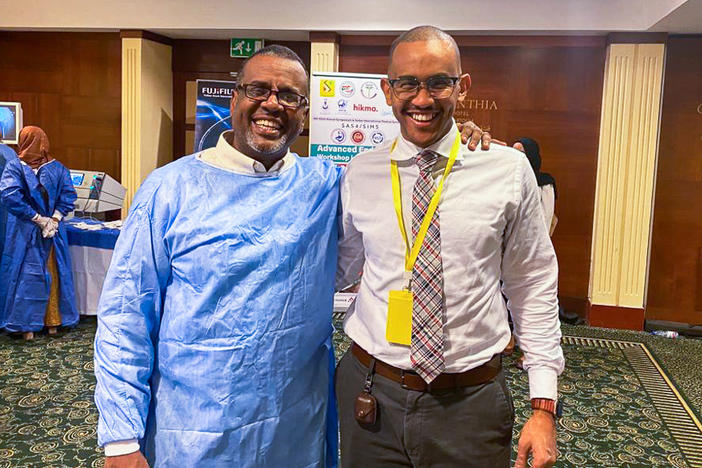 Dr. Bushra Sulieman (left) and Dr. Mohamed Eisa in February 2023 at a workshop in Khartoum. Sulieman was killed on April 25 in Khartoum. It's believed he was stabbed to death during a robbery attempt amid the turmoil of the conflict that has broken out in Sudan.