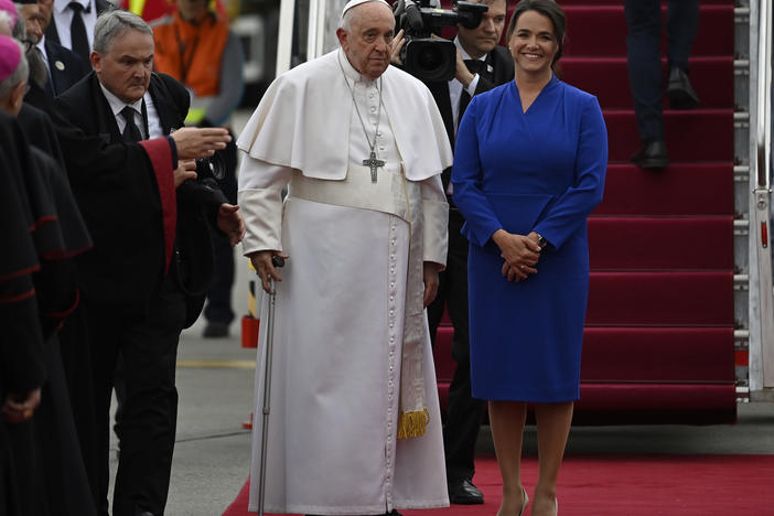 Pope Francis is greeted by Hungary President Katalin Novak during the farewell ceremony at the Budapest International Airport in Budapest, Hungary, on Sunday.