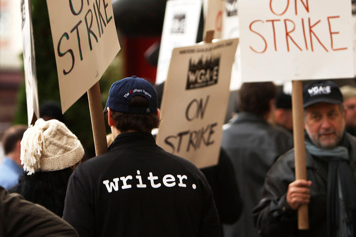 Members of the Writers Guild of America walk the picket line in 2007.