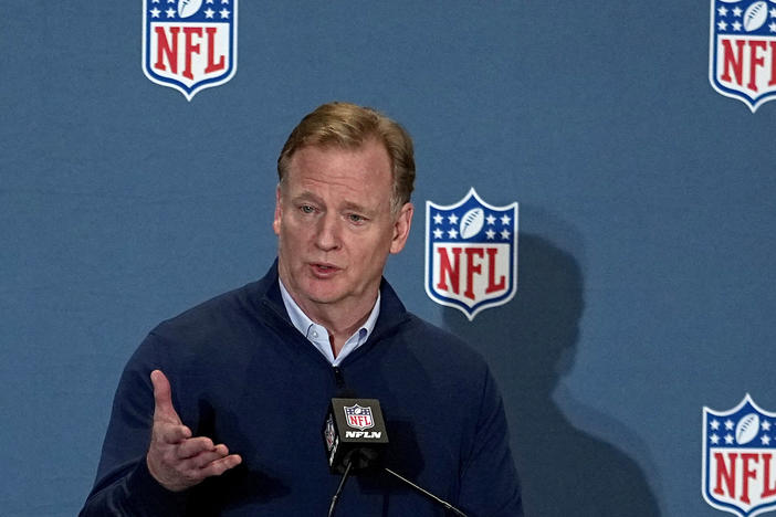 NFL Commissioner Roger Goodell speaks to the media on March 28 in Phoenix. The attorneys general of New York and California announced Thursday that they are investigating allegations of workplace discrimination by the pro football league.