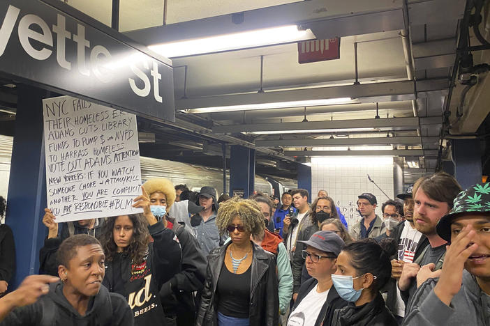 Protesters march through the Broadway-Lafayette subway station to protest the death of Jordan Neely on Wednesday in New York.