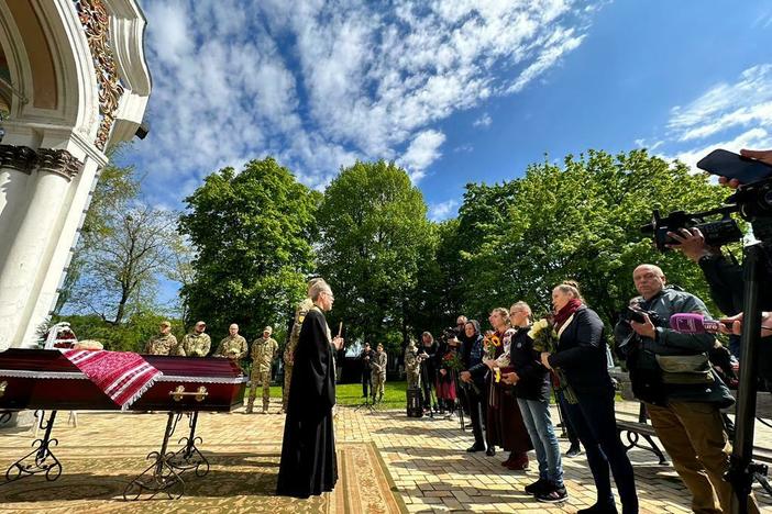 Father George Kovalenko gives a eulogy at Christopher James Campbell's funeral in Kyiv, Ukraine on May 5, 2023.
