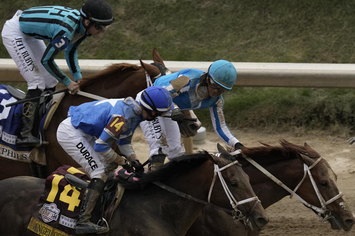 Javier Castellano celebrates after riding Mage to win the 149th running of the Kentucky Derby horse race at Churchill Downs Saturday, May 6, 2023, in Louisville, Ky.