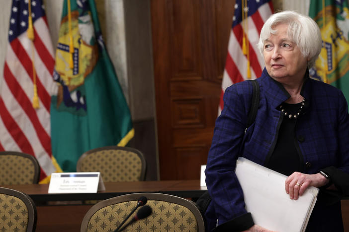 Treasury Secretary Janet Yellen leaves a meeting on April 21. She warns that economic chaos will ensue if Congress doesn't raise the debt ceiling in the coming weeks.
