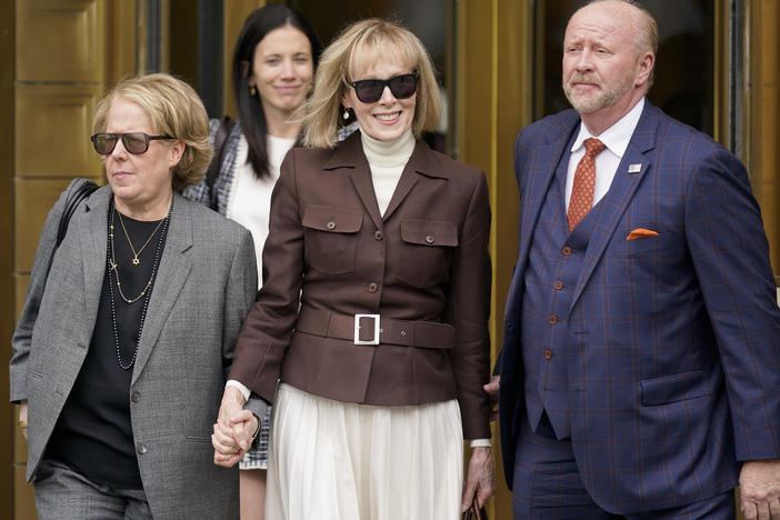 E. Jean Carroll (center) departs the Manhattan courthouse where a jury awarded her $5 million after finding former President Donald Trump liable for sexually abusing her in the mid-1990s.