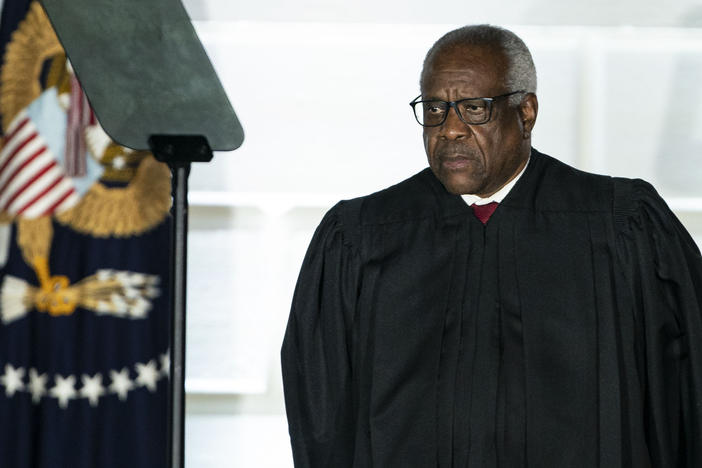 Supreme Court Justice Clarence Thomas listens during a ceremony on the South Lawn of the White House in 2020.