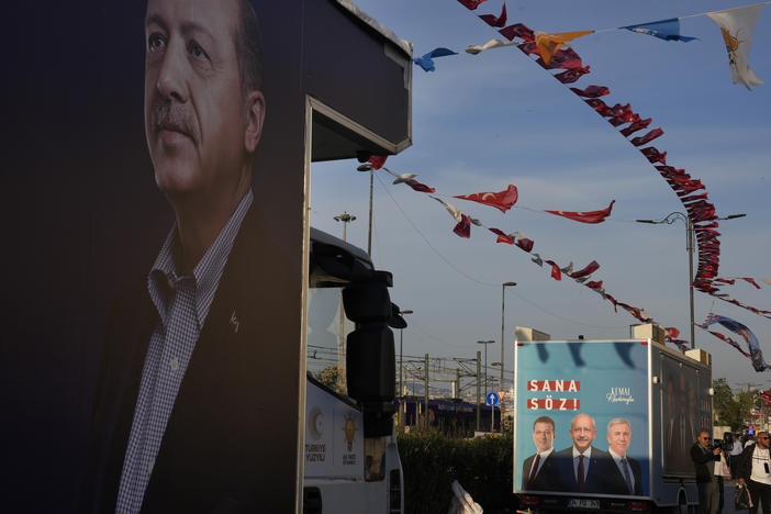 A poster of President Recep Tayyip Erdogan, left, on a truck near an election poster of presidential candidate Kemal Kilicdaroglu in Istanbul, Turkey, May 8.