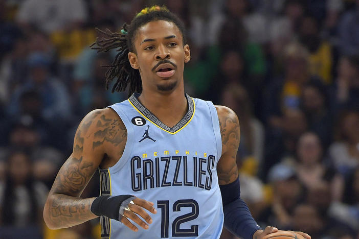 Memphis Grizzlies guard Ja Morant handles the ball during the first half of Game 5 in a first-round NBA basketball playoff series against the Los Angeles Lakers on Wednesday, April 26, in Memphis, Tenn.