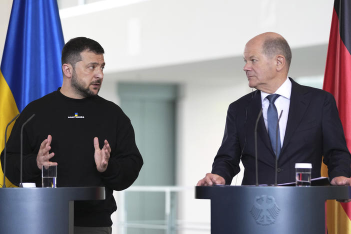 Germany's Chancellor Olaf Scholz, right, and Ukraine's President Volodymyr Zelenskyy address a media conference at the chancellery in Berlin, Germany, Sunday, May 14, 2023. Ukrainian President Volodymyr Zelenskyy arrived in Berlin early Sunday for talks with German leaders about further arms deliveries to help his country fend off the Russian invasion and rebuild what's been destroyed in the war.