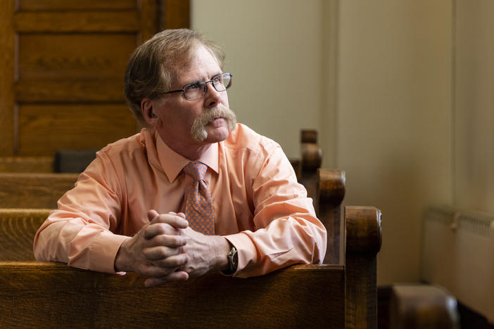 Pastor Douglas Theobald, who has been at Struthers United Methodist Church for more than a decade, poses for a portrait on Sunday at the church in Struthers, Ohio.